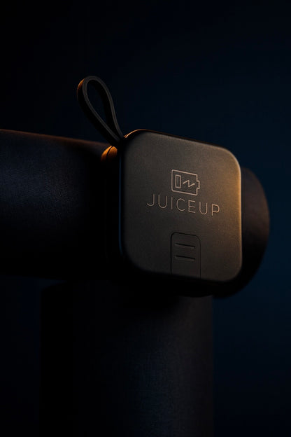JuiceUp 5in1 Travel Power Bank | Supports wireless charging | Black variant on a dark background creative